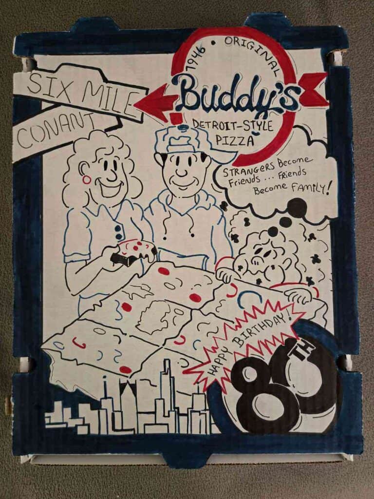 Hand-drawn Buddy's Pizza sign with Detroit-style pizza and birthday celebration.